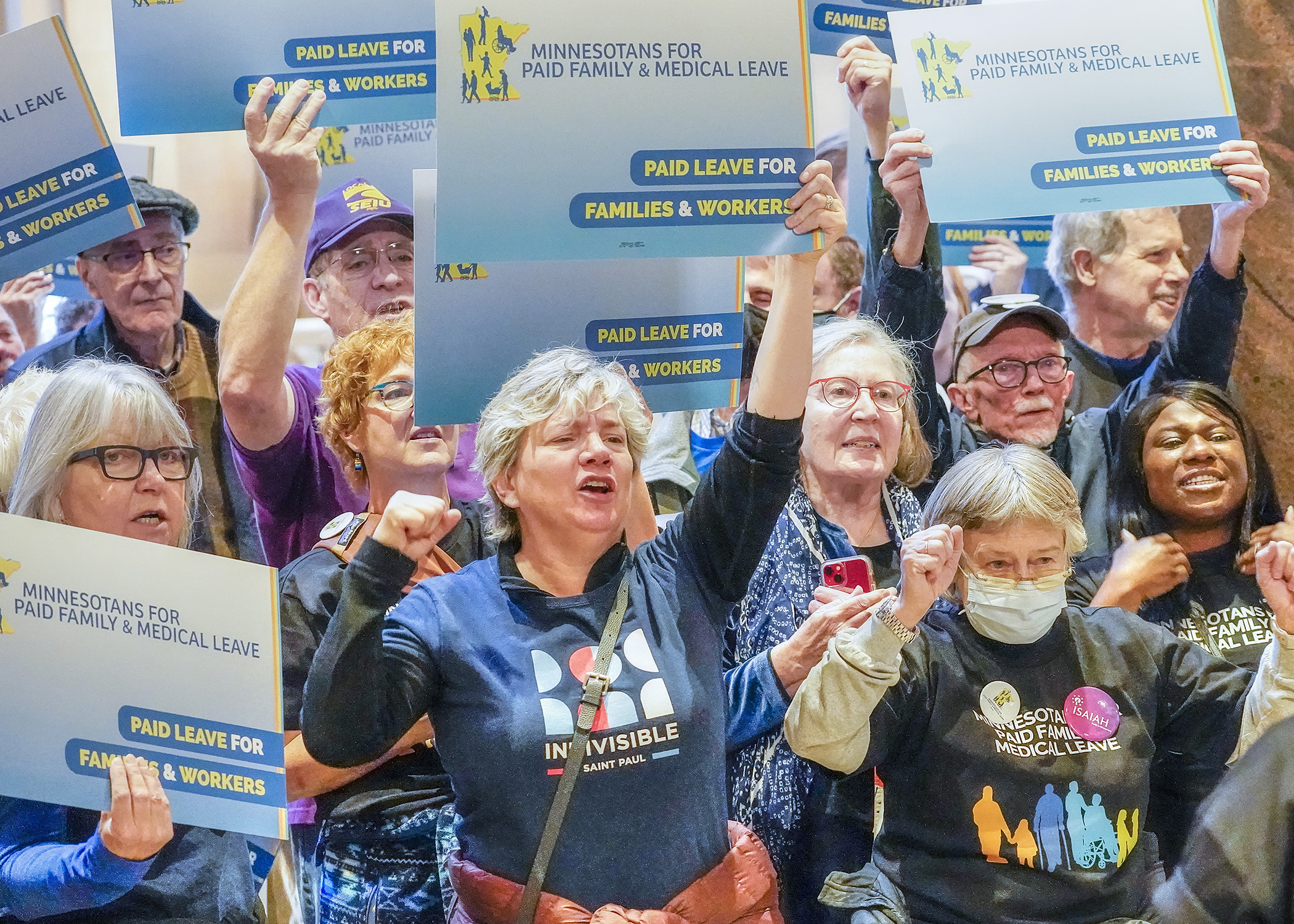 Supporters of paid medical leave rallied in front of the House Chamber May 2 before House Floor debate on HF2. (House Photography file photo)